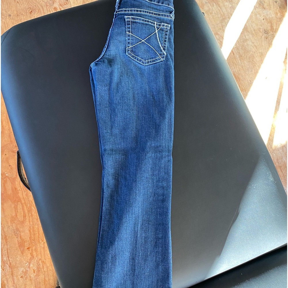 Girls size 16 Ariat jeans. Excellent condition. Fit nice.